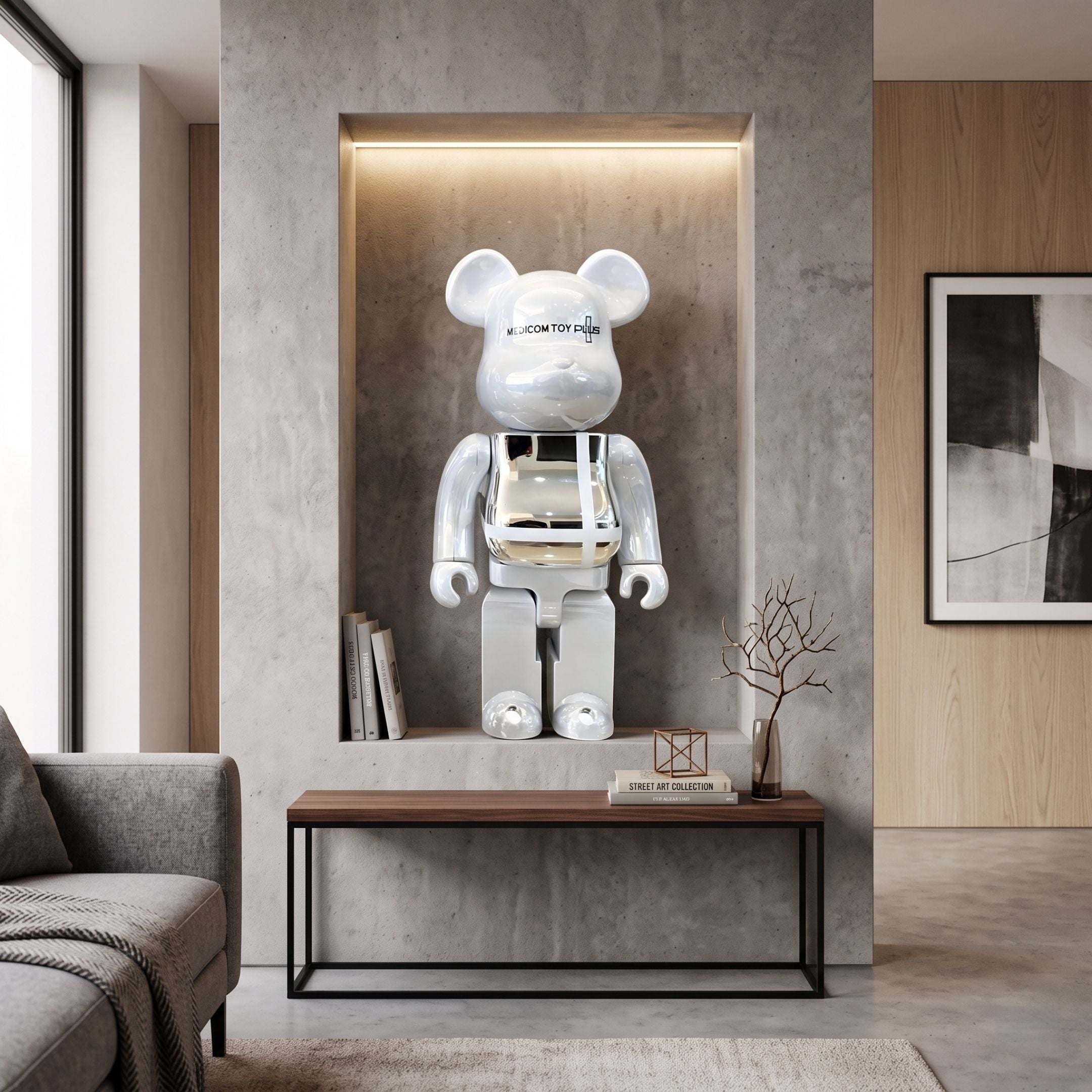 Atelier White Grid Bear Sculpture, 70cm, chrome mirror torso and matte white grid head/limbs, displayed in a wall-lit alcove above a wooden bench in a modern living room.