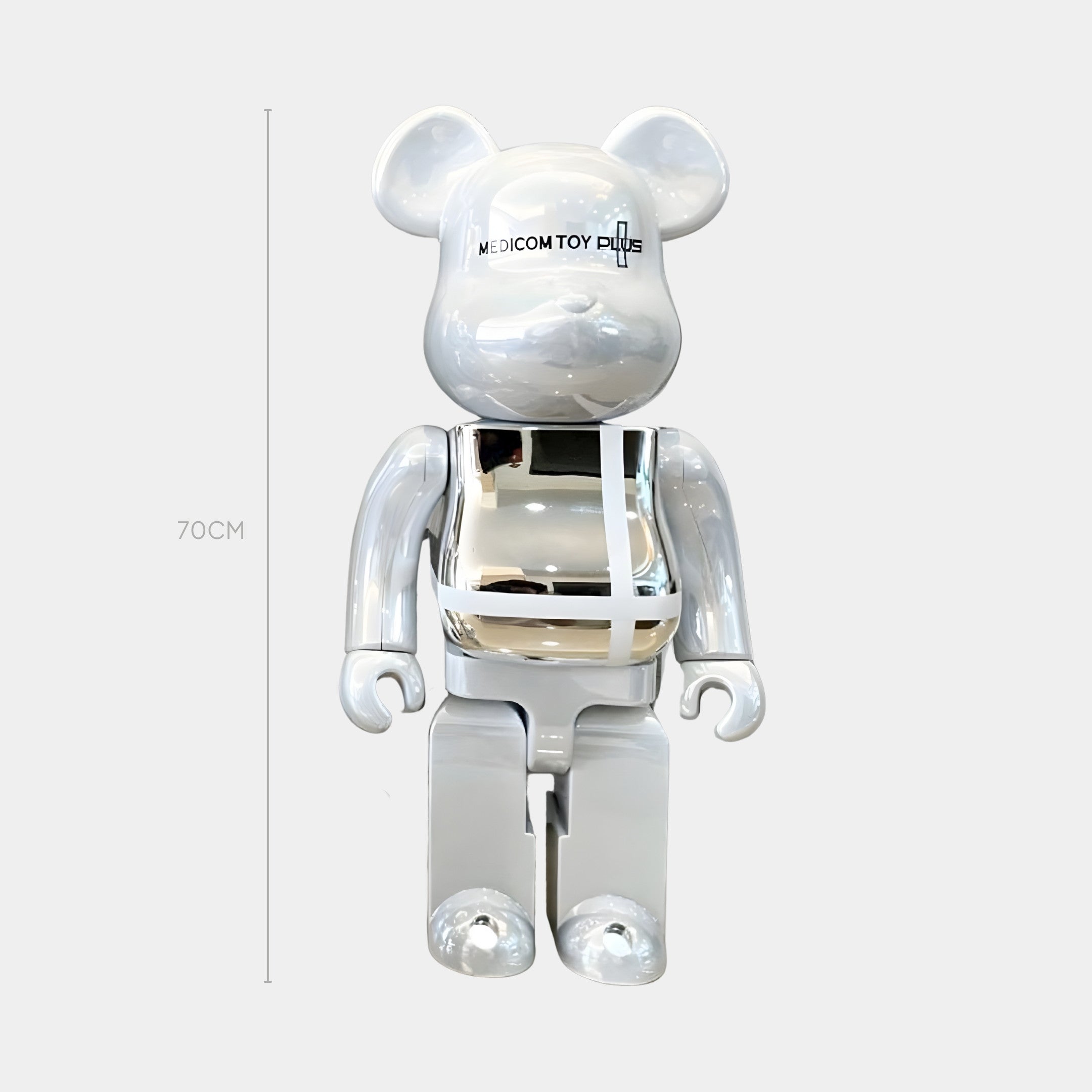 The Atelier White Grid Bear Sculpture by Giant Sculptures stands upright on a light gray background, featuring a shiny chrome torso and a height of 70 cm.