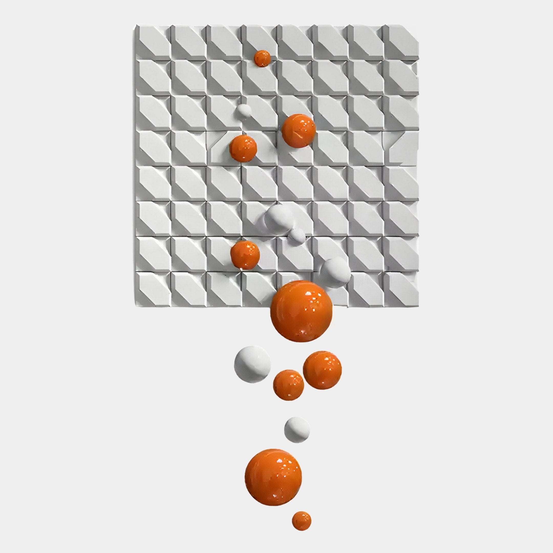 The Orbina White 3D Wood Relief Wall Art by Giant Sculptures features a grid of raised white squares with diagonal lines, accented by glossy orange and white metal spheres in a dynamic upward arrangement.