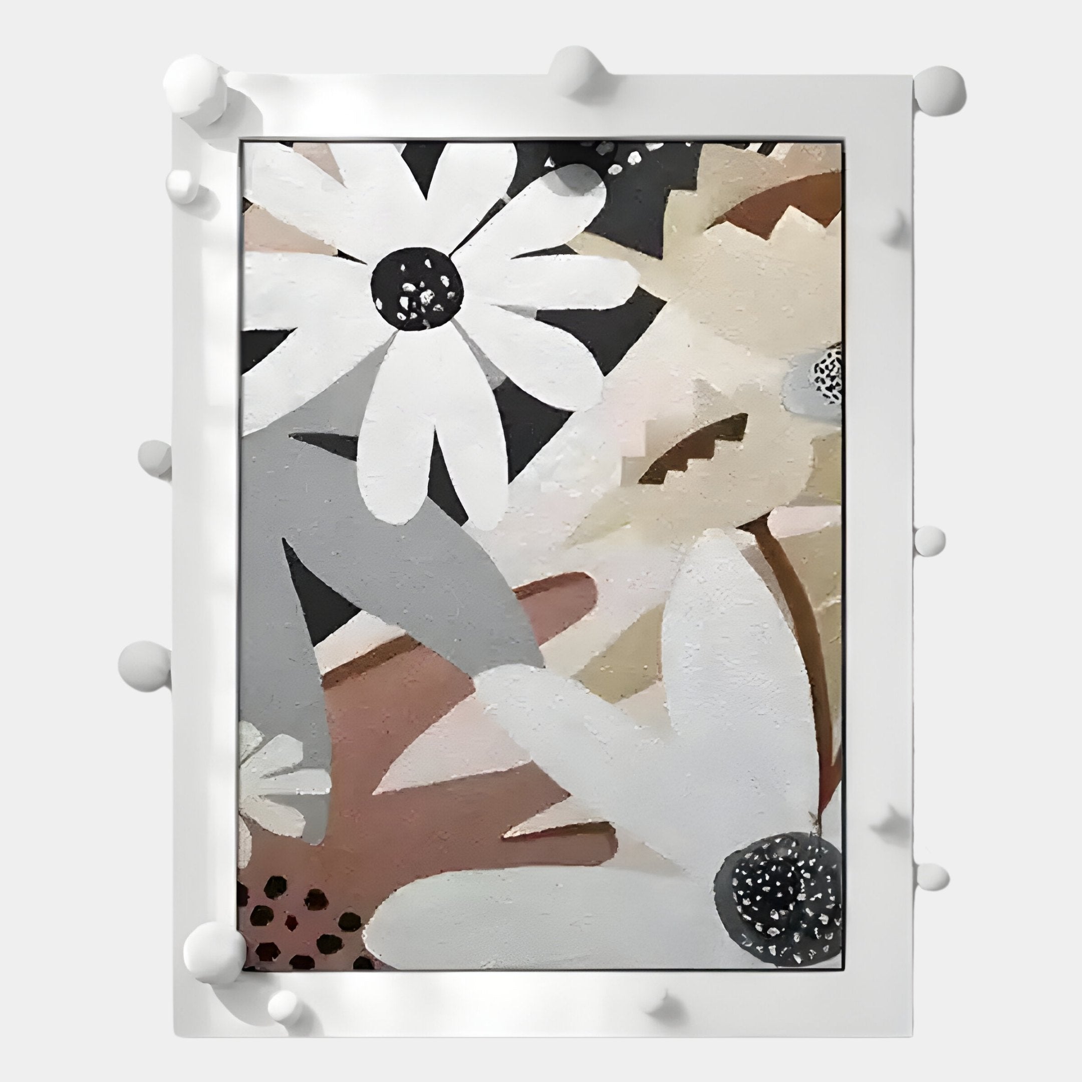 Florere Neutral Bloom Hand-Painted Sandstone 3D Wall Art by Giant Sculptures features abstract white flowers with black centers, beige, gray, and brown leaves, all set in a white frame with round raised knobs for a dimensional effect.