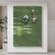 The Verdara Green Wood Relief 3D Wall Art by Giant Sculptures, featuring metallic abstract shapes on a textured green surface with leaf-like wavy patterns, is displayed on a wall. A potted plant in the corner enhances its modern aesthetic for an engaging visual experience.