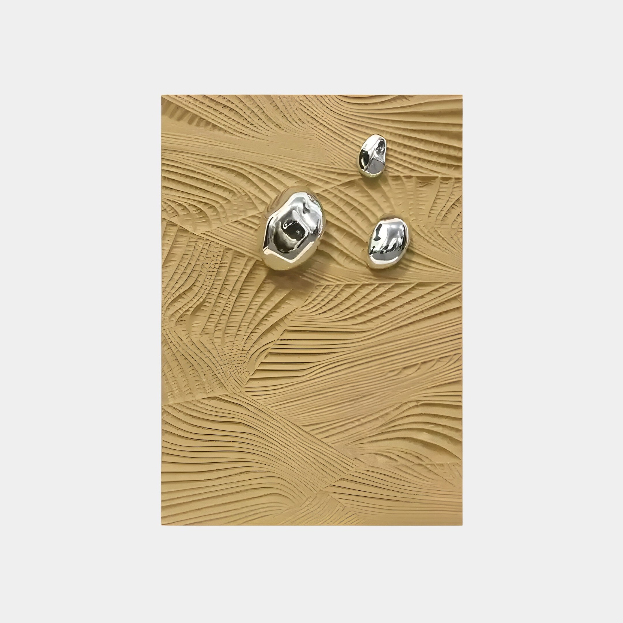 The Verdara Beige Wood Relief 3D Wall Art by Giant Sculptures features a textured beige background with wave-like patterns and metallic accents in the form of three shiny spheres of various sizes, creating a striking contrast.
