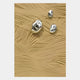 The Verdara Beige Wood Relief 3D Wall Art by Giant Sculptures displays intricate wavy textures in beige wood, topped with three irregular silver accents, blending organic and metallic elements for a sophisticated decor piece.