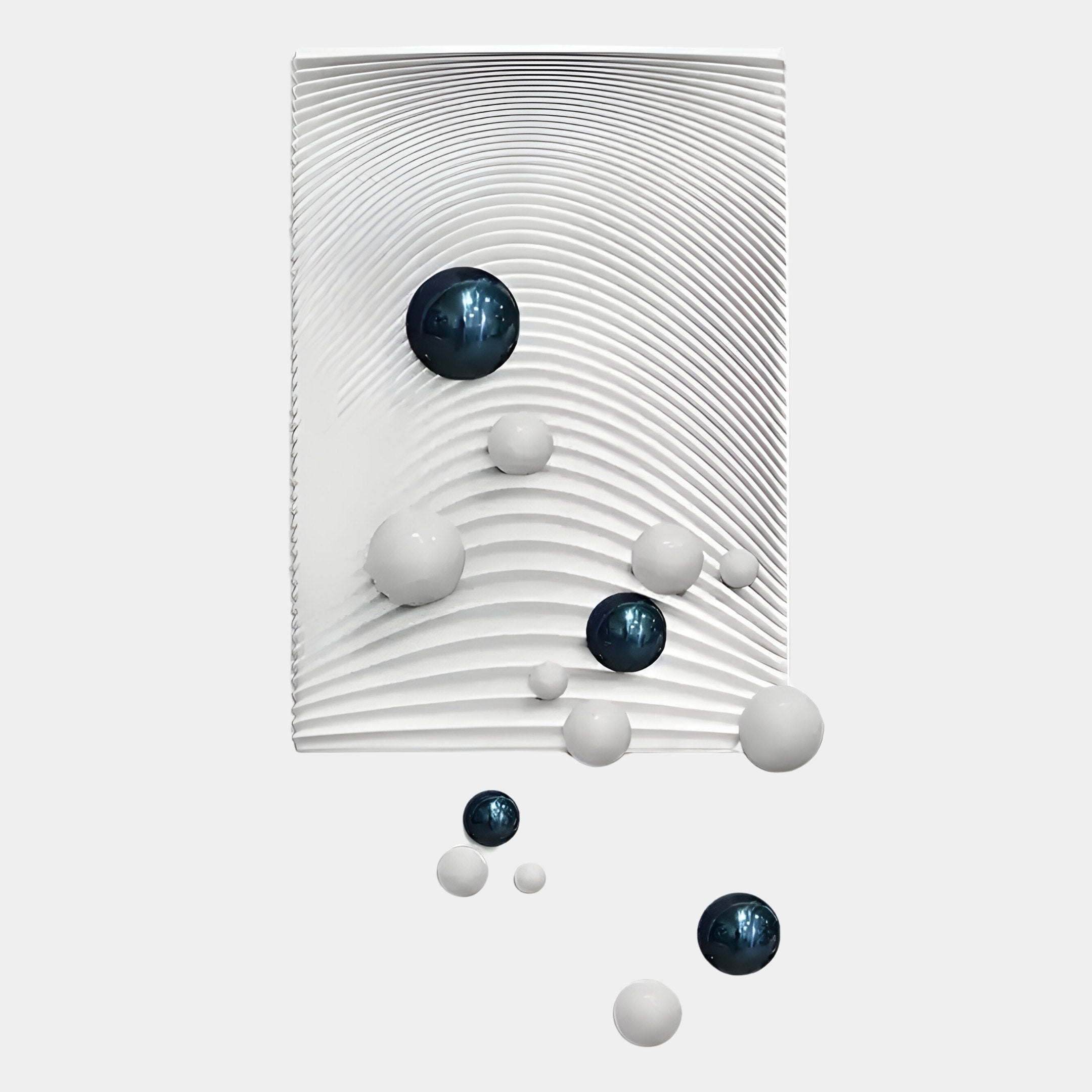 The Sphera White 3D Wood Relief Wall Art by Giant Sculptures features a white rectangular panel with wavy ridges and floating blue and white metal balls of varying sizes against a plain light background.
