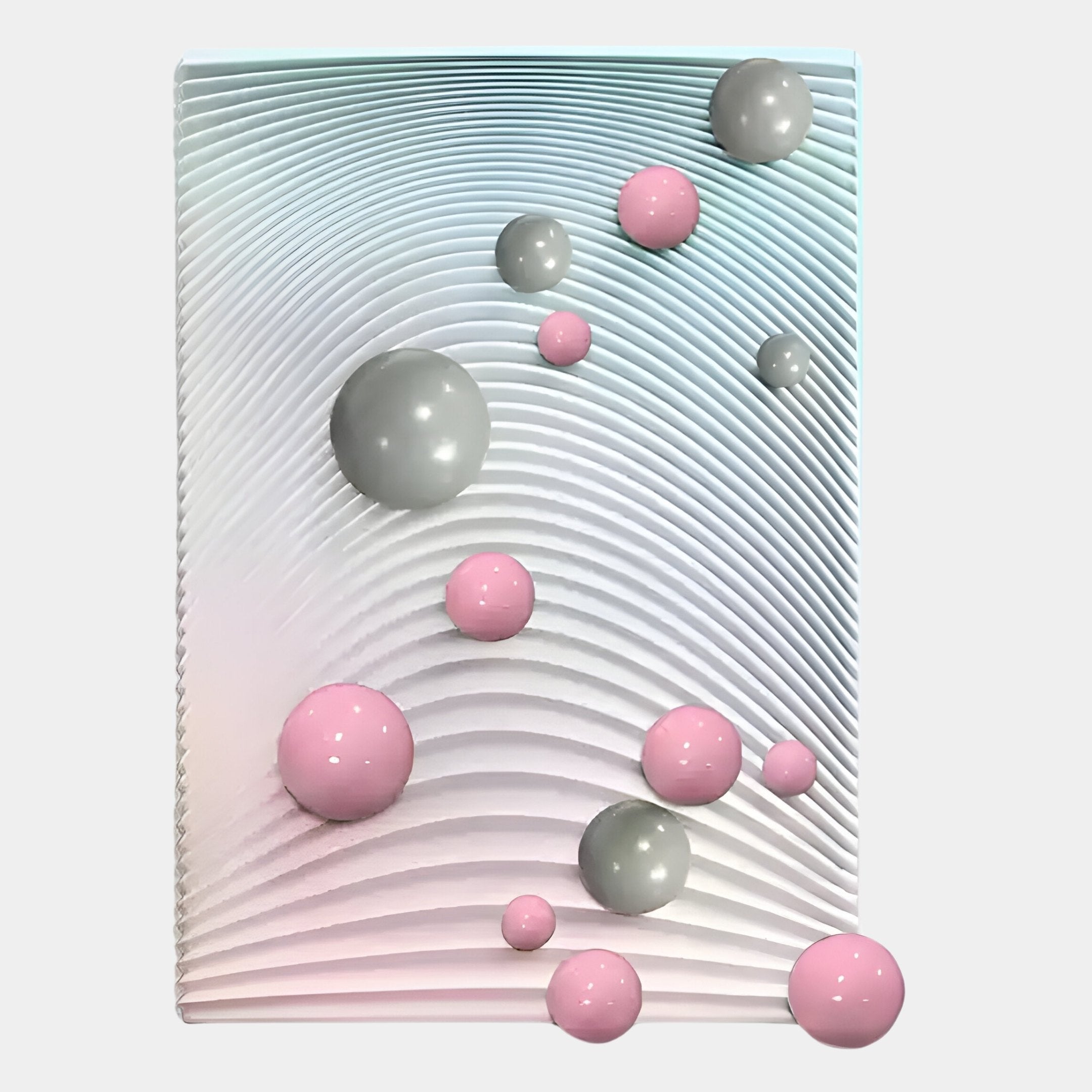 The Sphera Gradient 3D Wood Relief Wall Art by Giant Sculptures features curved, raised lines on a white background, accented with glossy grey and pink metal balls in pastel tones for a striking contemporary look.