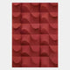 The Ondula Textured Red Wood Relief 3D Wall Art by Giant Sculptures features a grid of red tiles with wave-like curves, creating a dynamic geometric pattern and striking interplay of light and shadow.
