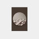 On a dark wall, a round textured mirror reflects abstract dunes, echoing the elegance of Solivis Desert 3D Wood Relief by Giant Sculptures. This minimalist piece doubles as art, creating an impressionistic and serene indoor atmosphere.