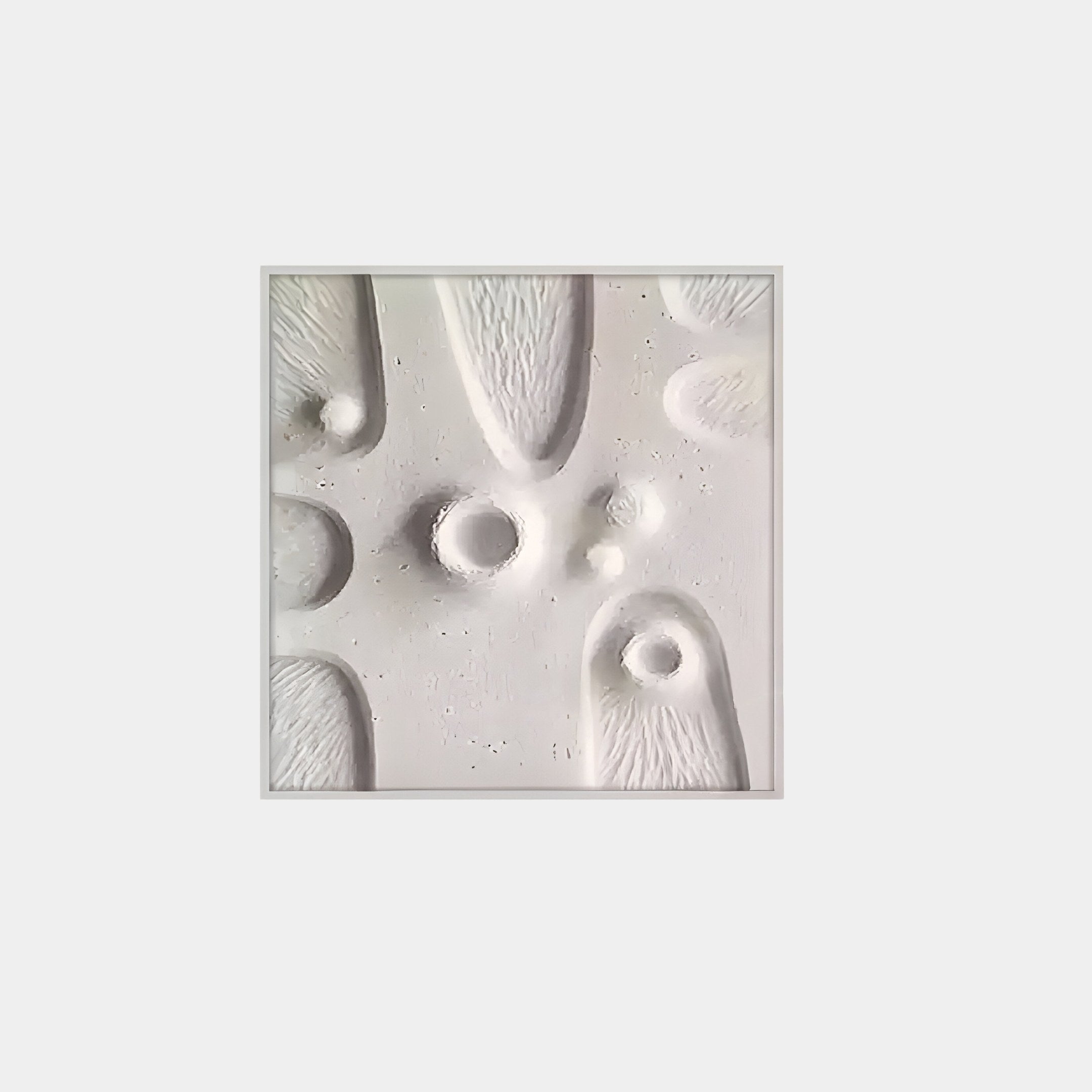 The Terravura Square Soft White II 3D Wood Relief Wall Art by Giant Sculptures is an abstract piece with rounded and oblong indentations, visible brushstroke patterns, and shadow play that evokes minimalist décor.