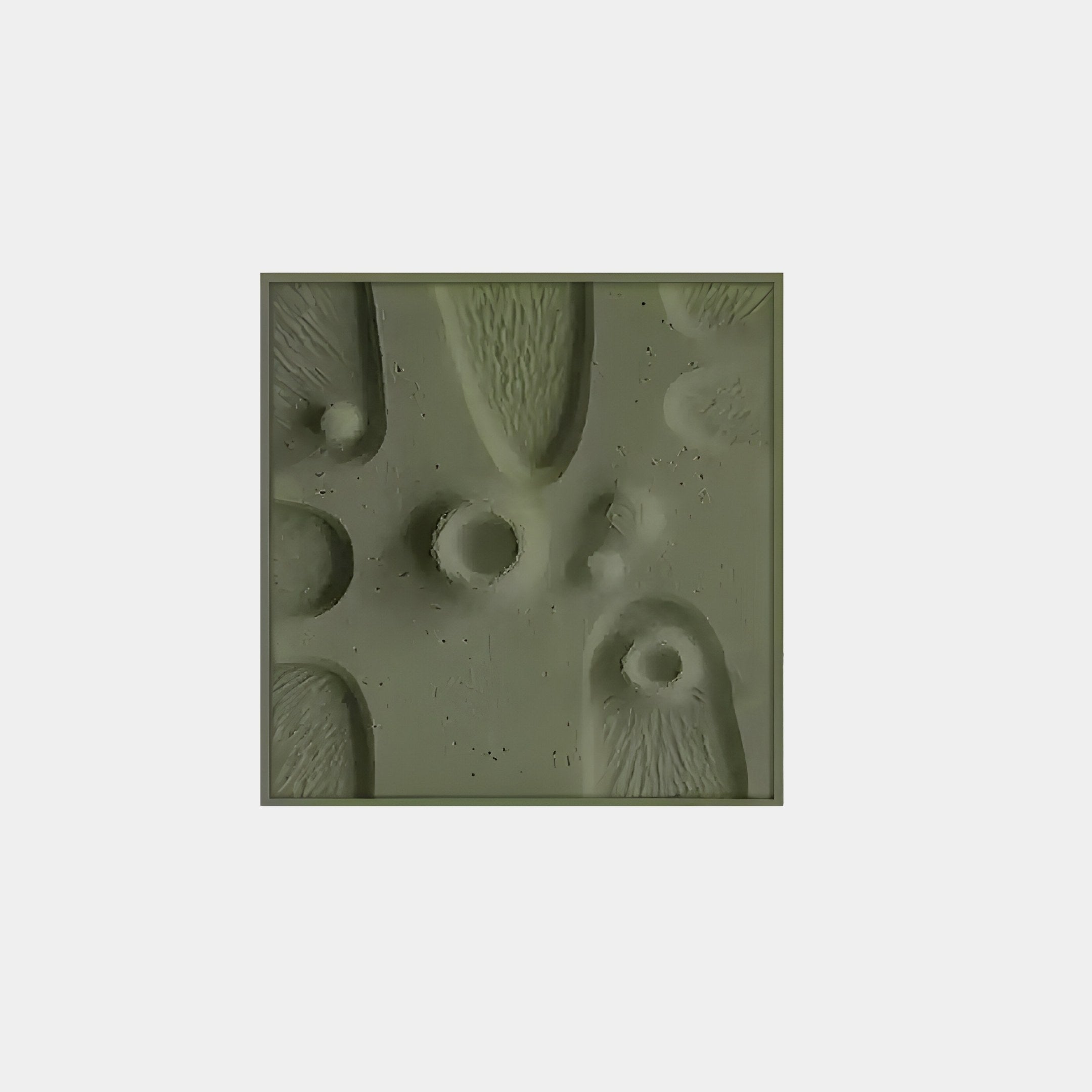 The Terravura Square Olive Green II 3D Wood Relief Wall Art by Giant Sculptures features a textured olive green design with elongated shapes and circular depressions on a plain, light-colored background, enhancing its nature-inspired appeal that evokes organic forms or microscopic organisms.