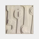 The Terravura Square Sandstone I 3D Wood Relief Wall Art by Giant Sculptures showcases abstract art with a textured white surface, raised rounded shapes, and curved lines. Its neutral hues and shadows create depth, enhancing the minimalist compositions serene and natural appeal.