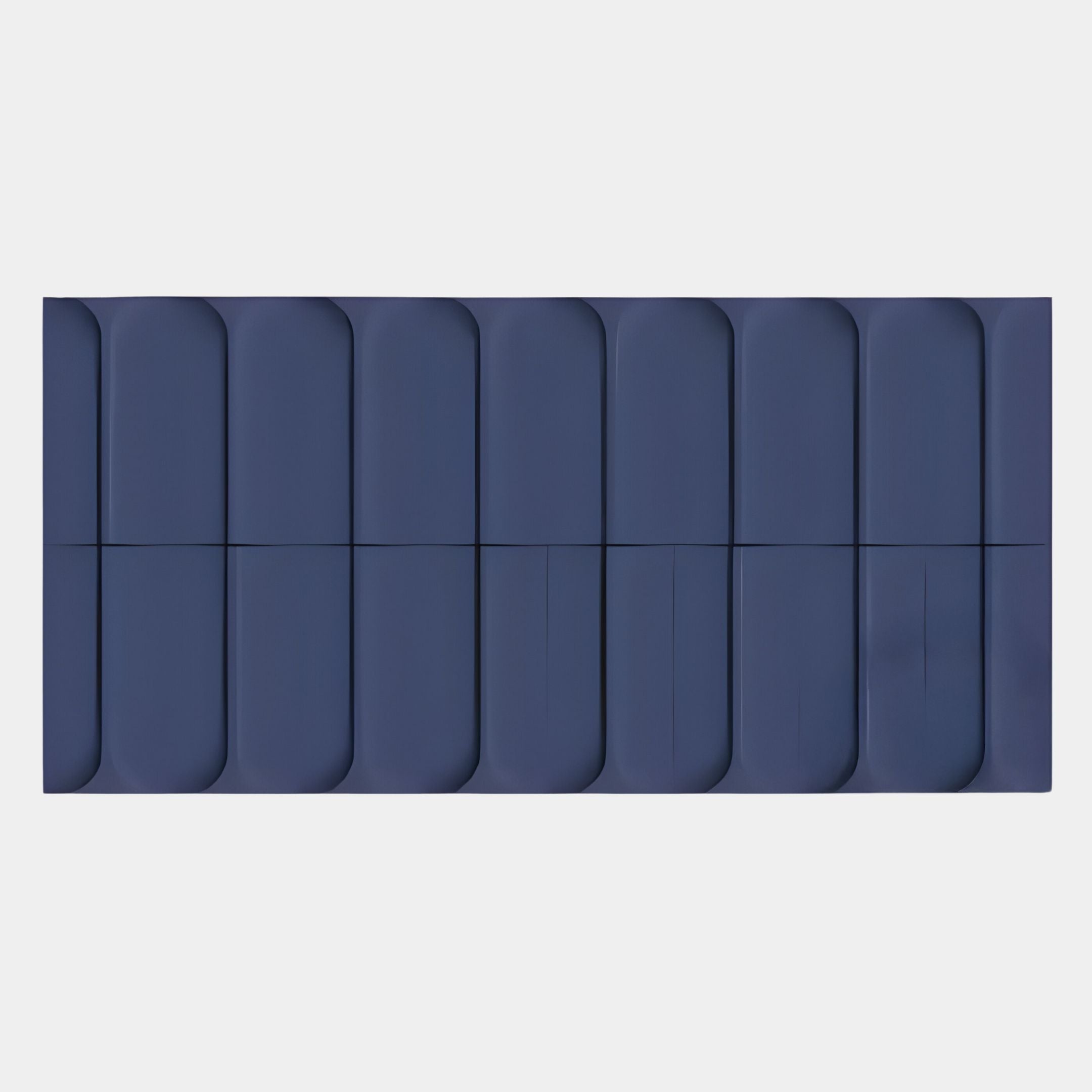 The Vireus Midnight Blue Rectangular 3D Wood Relief Wall Panel by Giant Sculptures features vertical, rounded midnight blue segments with subtle grooves on a light background, adding modern elegance and striking depth to any space.