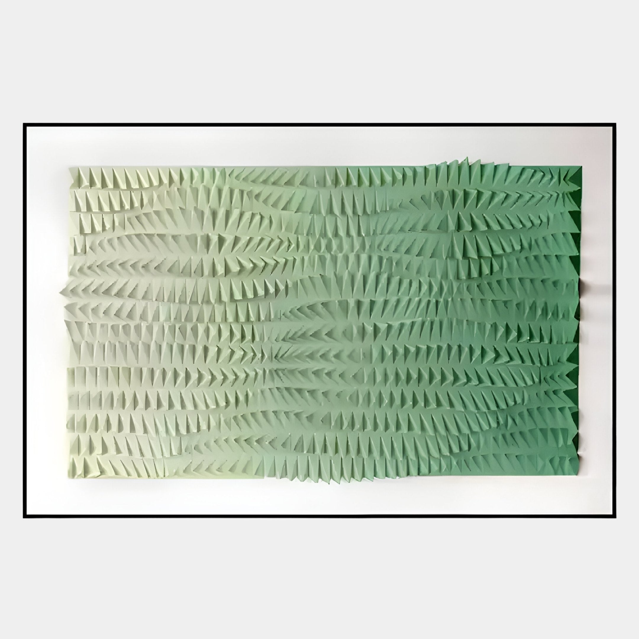 The Elytrum Green Gradient Hand-Painted Wood Relief 3D Wall Art by Giant Sculptures features raised geometric triangles in cream to green hues, creating a textured, wave-like visual effect.