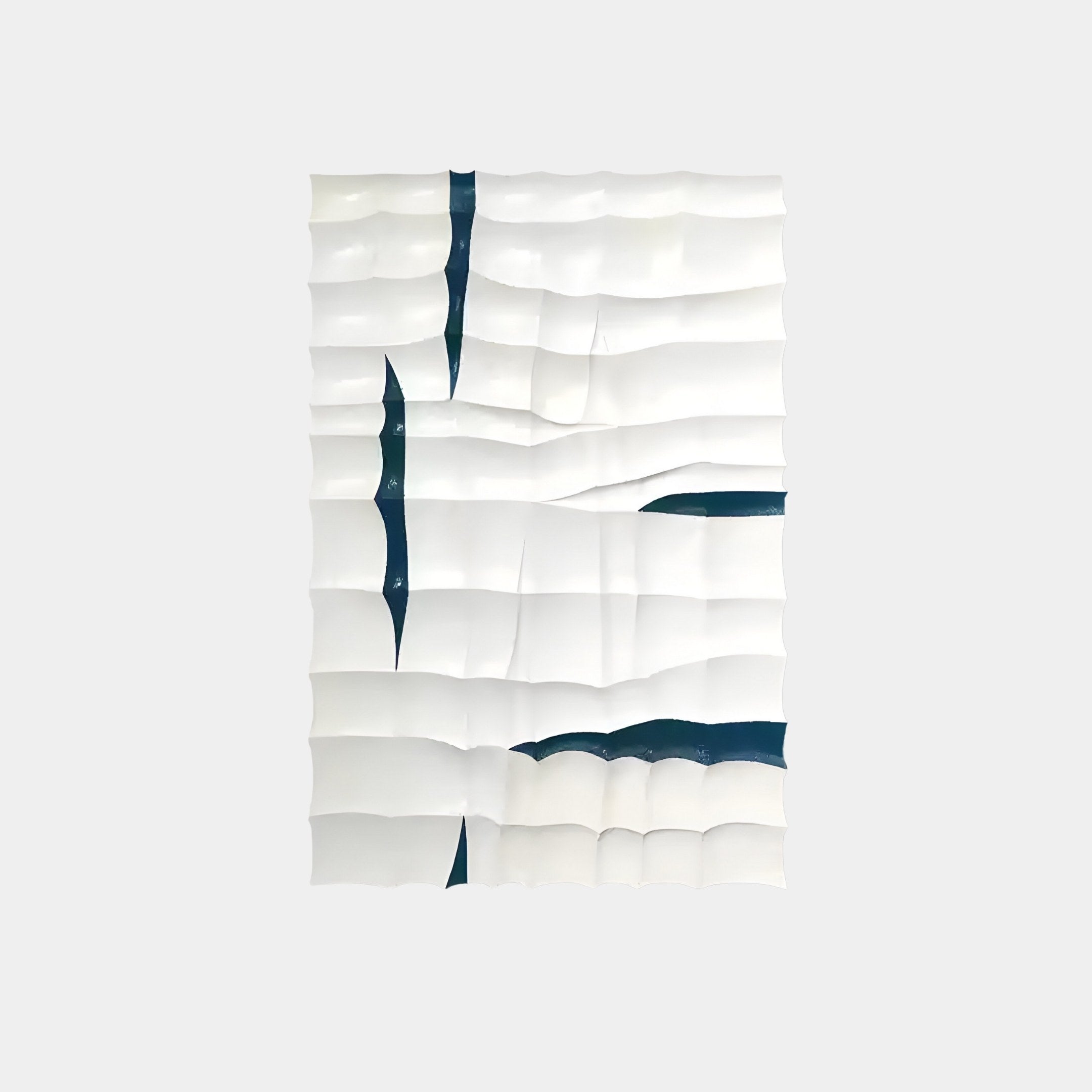 The Striata White & Blue Wood Carving 3D Wall Art by Giant Sculptures features a contemporary design with undulating white squares and irregular dark blue cracks, forming striking blue grid patterns that create wave-like effects on a plain, light gray background.