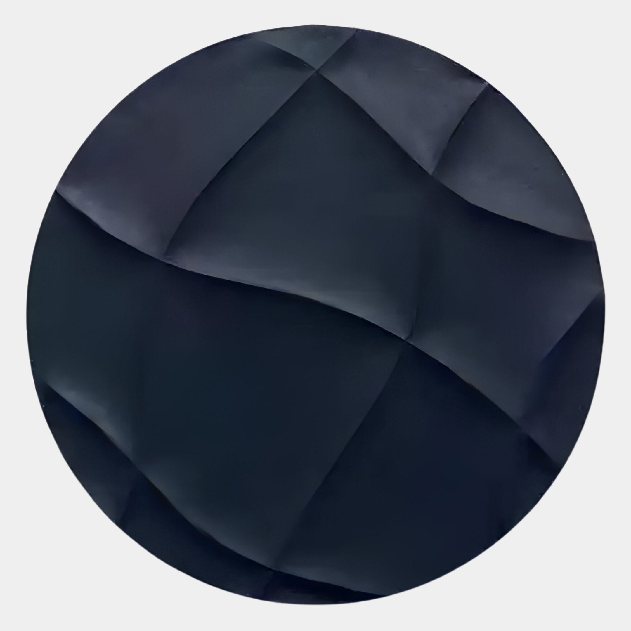 The Orbura Dark Blue Circular 3D Wood Relief Wall Art by Giant Sculptures features a textured, geometric surface with intersecting curved lines and angular folds, creating striking modern wall art for any contemporary interior.