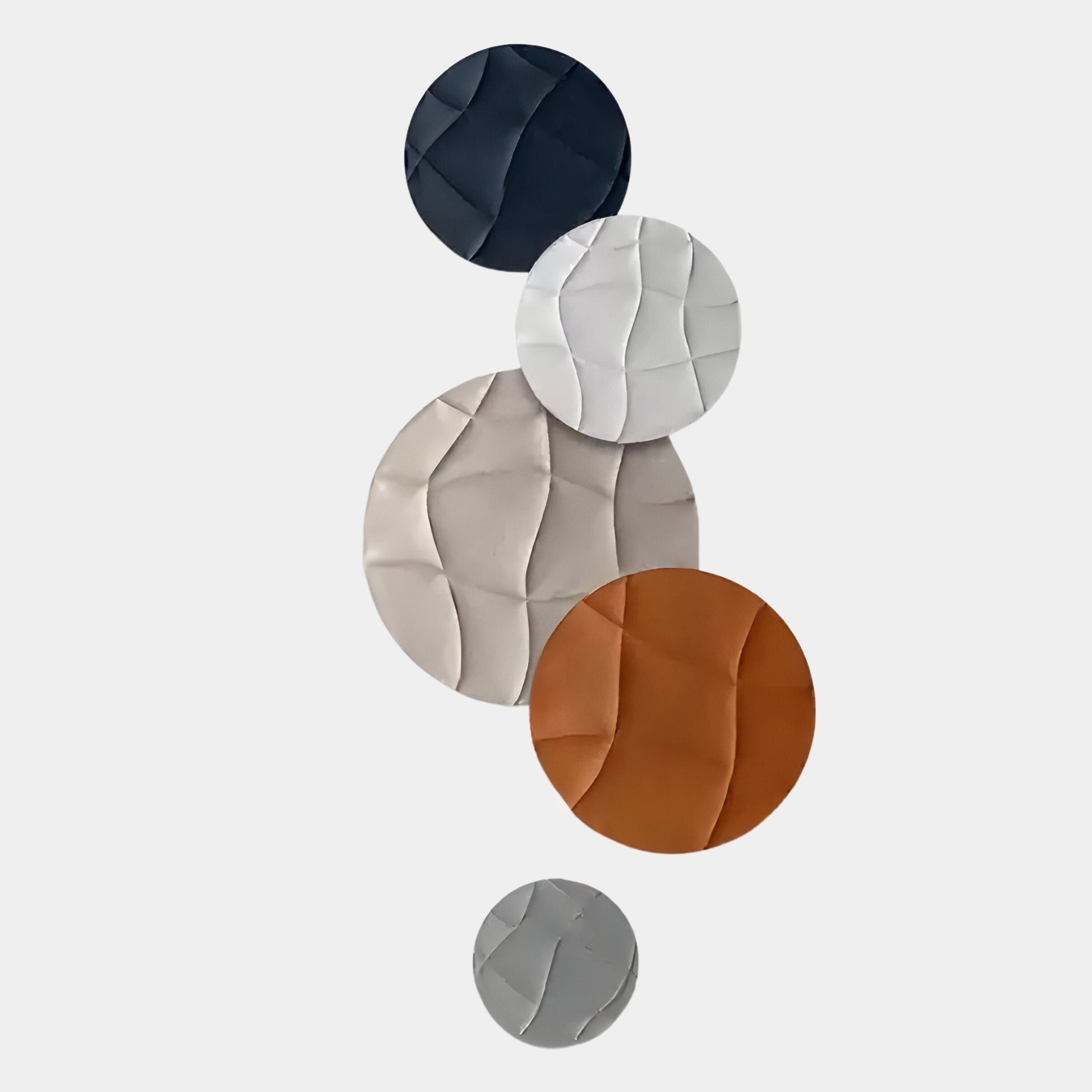 The Orbura 5-Set Circular Terra & Ivory 3D Wood Relief Wall Art by Giant Sculptures features textured, overlapping circles in neutral shades with a soft, sculpted look, evoking contemporary style in a vertical arrangement.