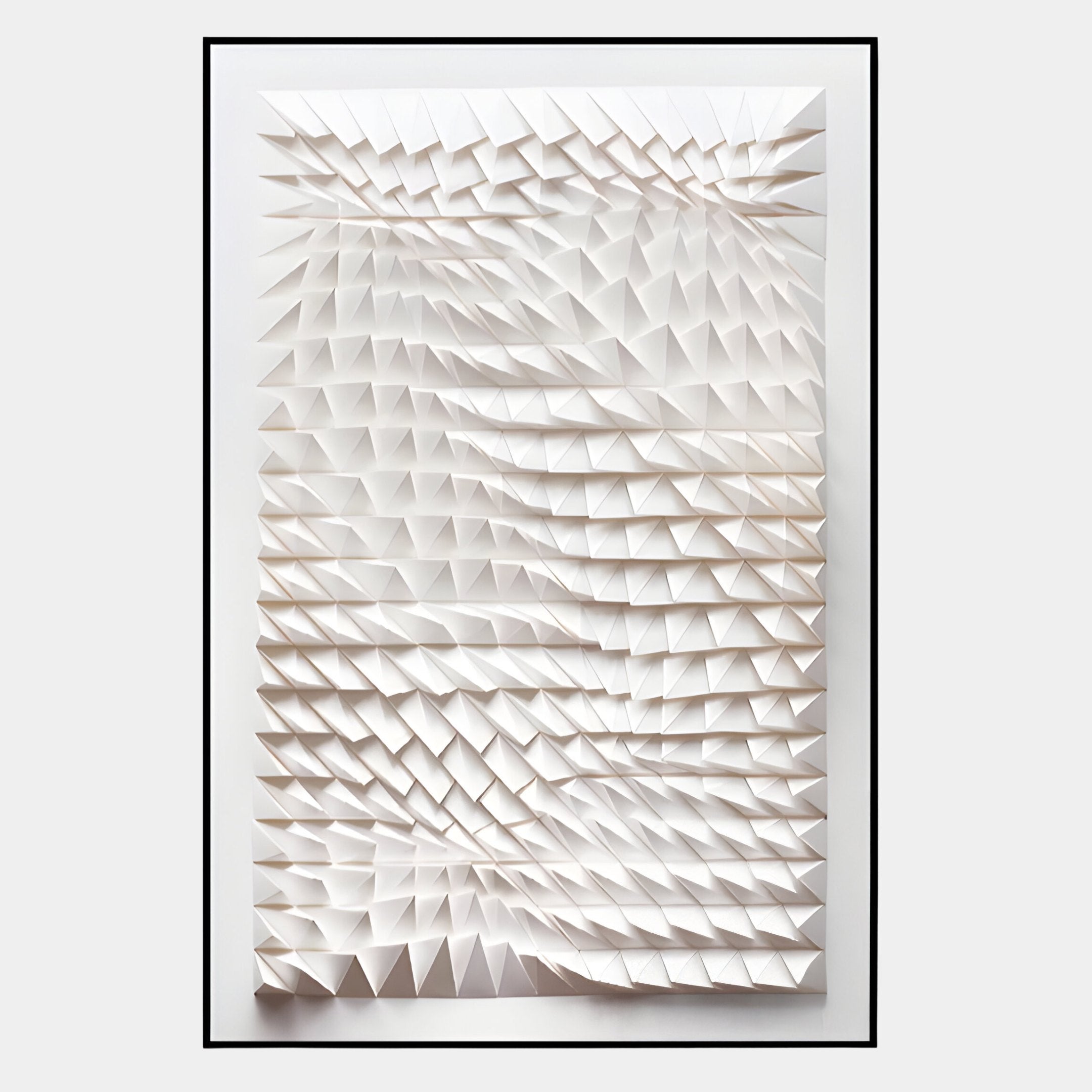 The Elorium White Wave Hand-Painted Wood Relief 3D Wall Art by Giant Sculptures showcases rows of folded, angular forms on a textured white surface in a black frame—ideal for adding contemporary flair to any space.
