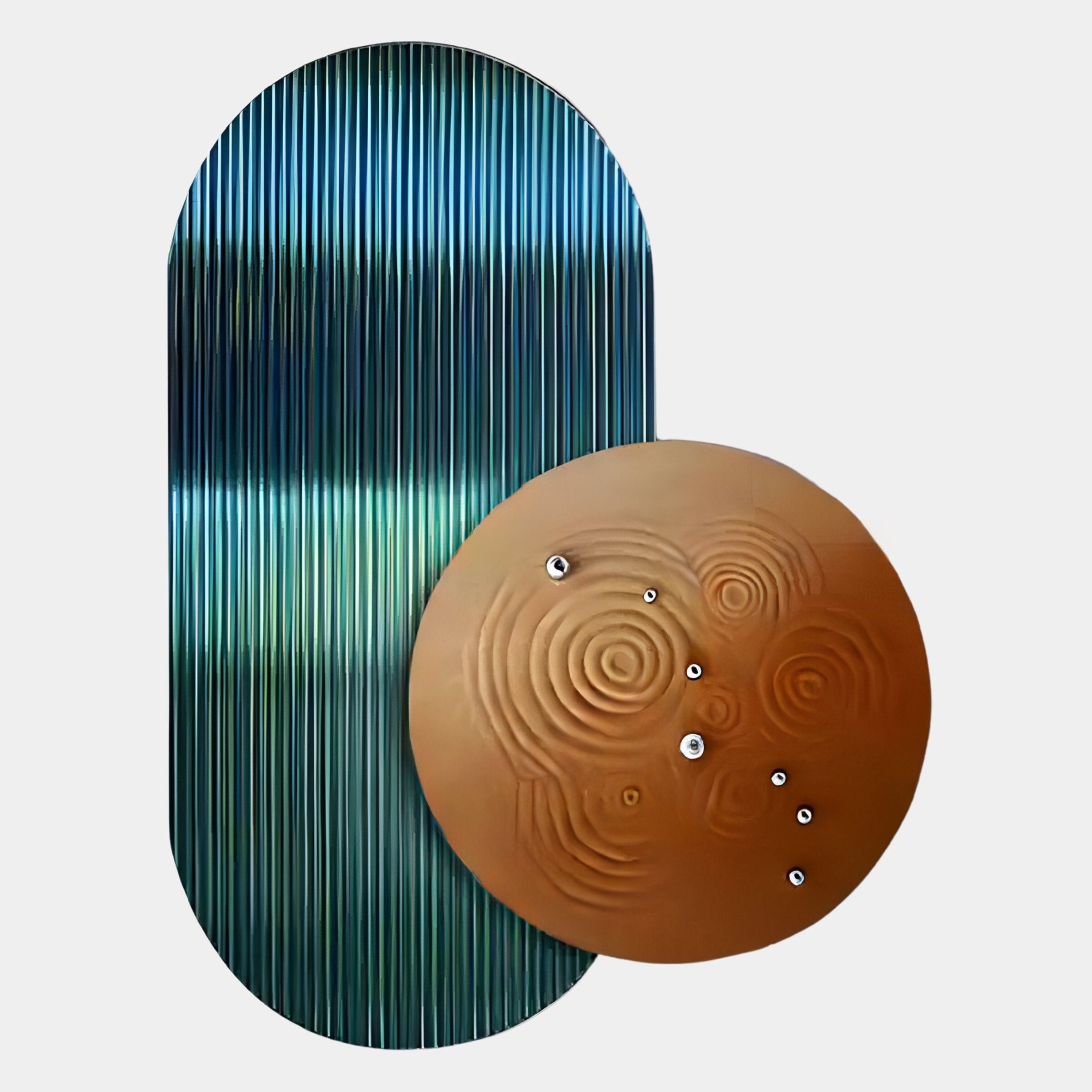 The Embera Abstract Circle Teal Ombre 3D Wall Art from Giant Sculptures features a tall, vertically ribbed teal ombre oval panel overlapped by a round bronze disc with mirrored accents and concentric circles.