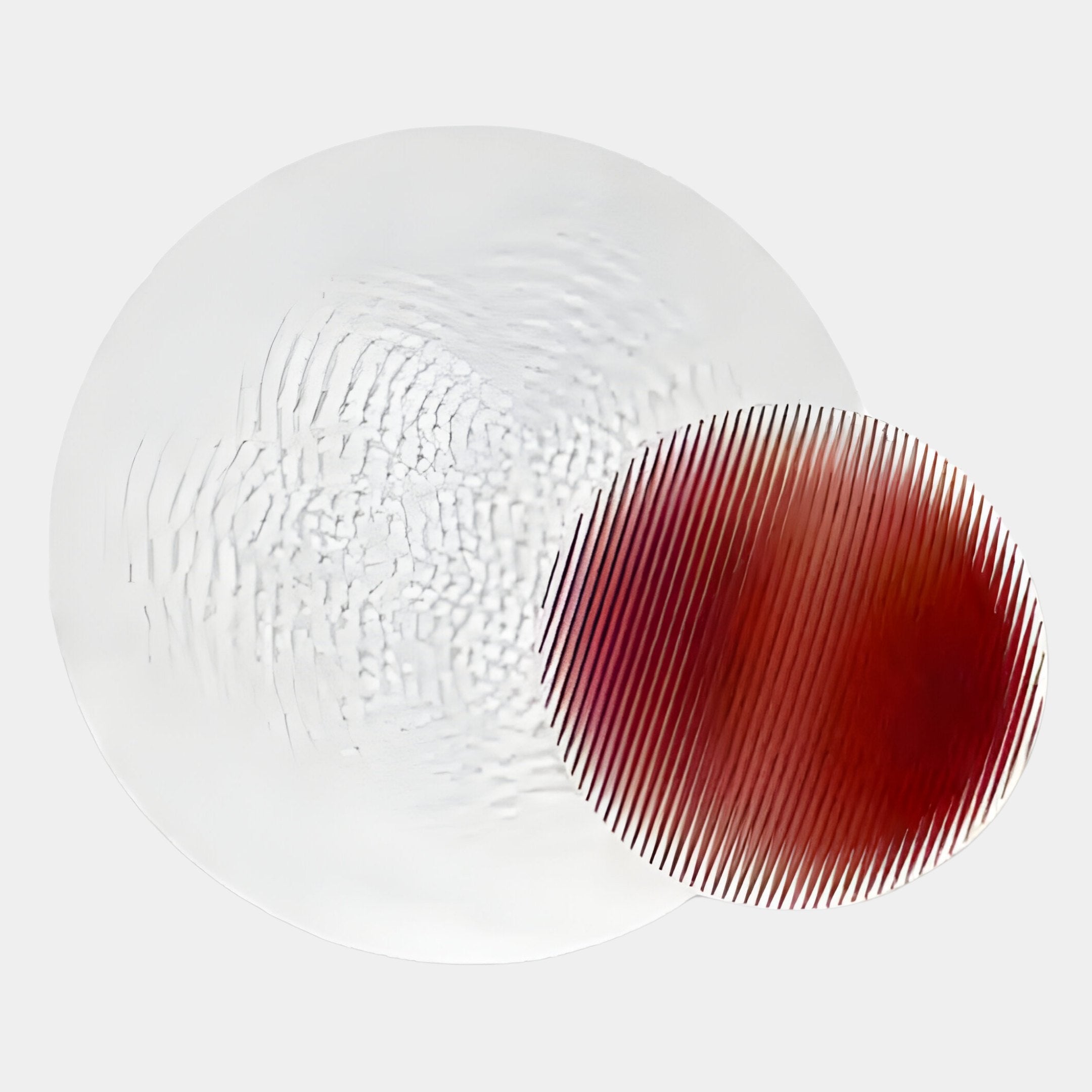 The Lucentis White & Burgundy Wood Relief 3D Wall Art by Giant Sculptures features a large wavy white circle overlapping a smaller red circle with diagonal lines, adding striking modern style to any plain light wall.