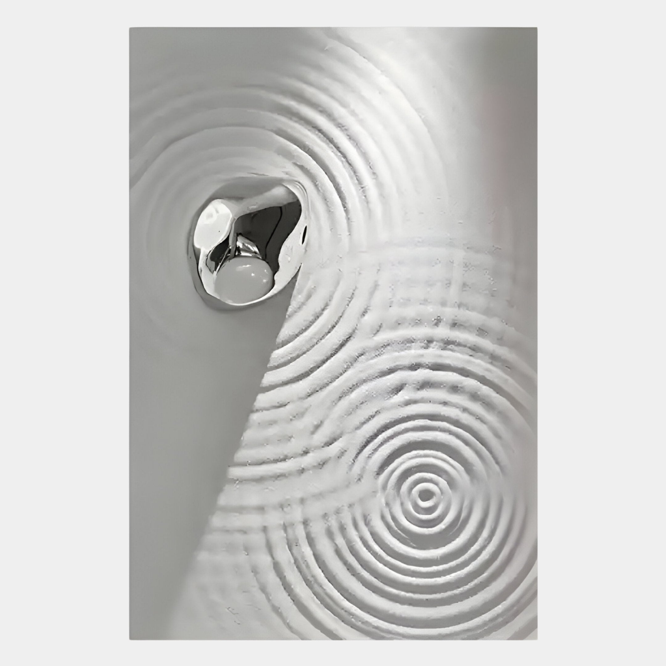Ondella Silver Ripple I Sandstone Wood Relief 3D Wall Art by Giant Sculptures features a smooth metallic pebble on rippled surfaces, casting elegant concentric patterns—perfect for adding Silver Ripple vibes to minimalist living rooms.