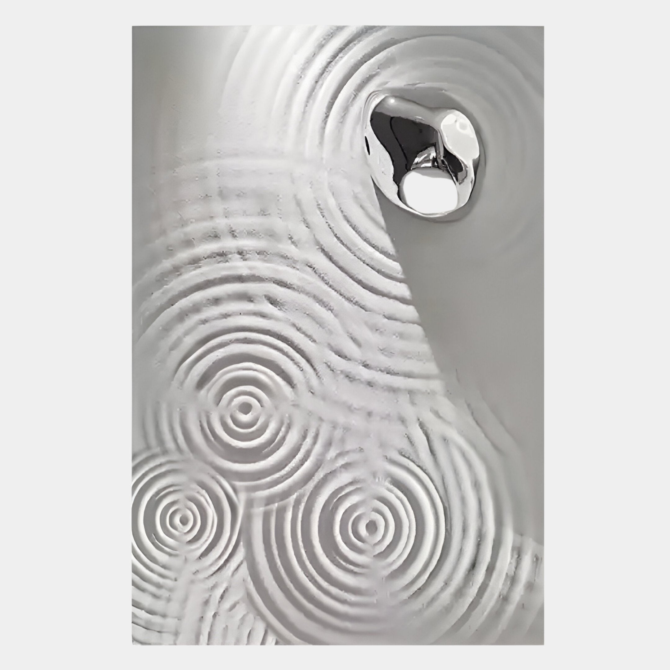 A metallic accent is set in a white surface with rippled patterns, evoking Giant Sculptures Ondella Silver Ripple IV Sandstone Wood Relief 3D Wall Art and reflecting subtle Wabi-sabi aesthetics.