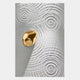 The Ondella Gold Ripple III Sandstone Wood Relief 3D Wall Art by Giant Sculptures features concentric white circular patterns and an off-center gold accent, creating a contemporary 3D effect with dynamic light and shadow.