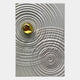A gold, irregularly shaped object rests on a textured white surface with radiating rings—an eye-catching Calidora Golden Ripple Textured 3D Relief Wall Art by Giant Sculptures that exudes modern luxury.