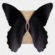 The Lucerna Black Butterfly Wood Carving 3D Wall Art by Giant Sculptures features black, textured surfaces that evoke butterfly wings in flight, resembling elegant wall art against a simple backdrop.