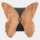 A wooden chair with a butterfly-shaped backrest and natural wood grain details mirrors the Lucerna Maple Butterfly Wood Carving 3D Wall Art by Giant Sculptures, featuring exquisite carving and a striking central black accent.