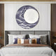 A modern bedroom highlights a neatly made bed with decorative pillows and the Reveria Dusty Lavender Abstract Wood Carving 3D Wall Art by Giant Sculptures above the headboard, featuring a textured white center on marbled lavender and gray.