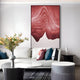 A modern living room with a white sofa and round coffee table showcases the Celoria Rose Ember Wood Carving 3D Wall Art by Giant Sculptures—a large abstract red and white mountain piece above the couch—complementing the Contemporary Interiors style.