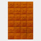 The Vellura Orange Textured Wood Relief 3D Wall Art by Giant Sculptures features a grid of abstract, leaf-patterned blocks in six rows and five columns—ideal as unique, modern wall decor.