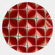 A circular arrangement of red, glossy, pyramid-shaped tiles with white edges forms the Incalia Red Circular Geometric Wood Relief 3D Wall Art by Giant Sculptures, creating a striking geometric pattern on a light background.