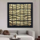 The Aurion Black & Gold Glossy Wood Carving 3D Wall Art by Giant Sculptures hangs above a modern white sectional, creating a striking focal point in this minimalist living room designed for contemporary interiors.