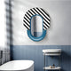 In the modern bathroom, the Arcus Blue & Black-White Striped Mirror 3D Wooden Wall Art by Giant Sculptures is a functional centerpiece above the white sink, enhancing the minimalist design with its sleek fixtures and complementing blue vertical paneling.