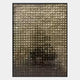 The Synova Gold I Hand-Painted Wood Relief 3D Wall Art by Giant Sculptures features abstract, dark shapes and striking depth, adding intrigue to any space—much like a rectangular glass block window with a grid pattern reflecting light.