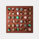 The Formexa Sphere Geometric Wood Relief 3D Wall Art by Giant Sculptures showcases a striking 5x5 sphere grid on a brown panel, with vibrant pink, turquoise, gray, and natural wood tones that form an eye-catching geometric pattern against a light gray background.