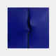 The Delinea Sapphire Blue Stretch Fabric 3D Wood Relief Wall Art by Giant Sculptures features two adjacent sapphire blue panels on a light gray background, with a subtle vertical crease for a gentle fold effect, making it a striking piece for modern interiors.