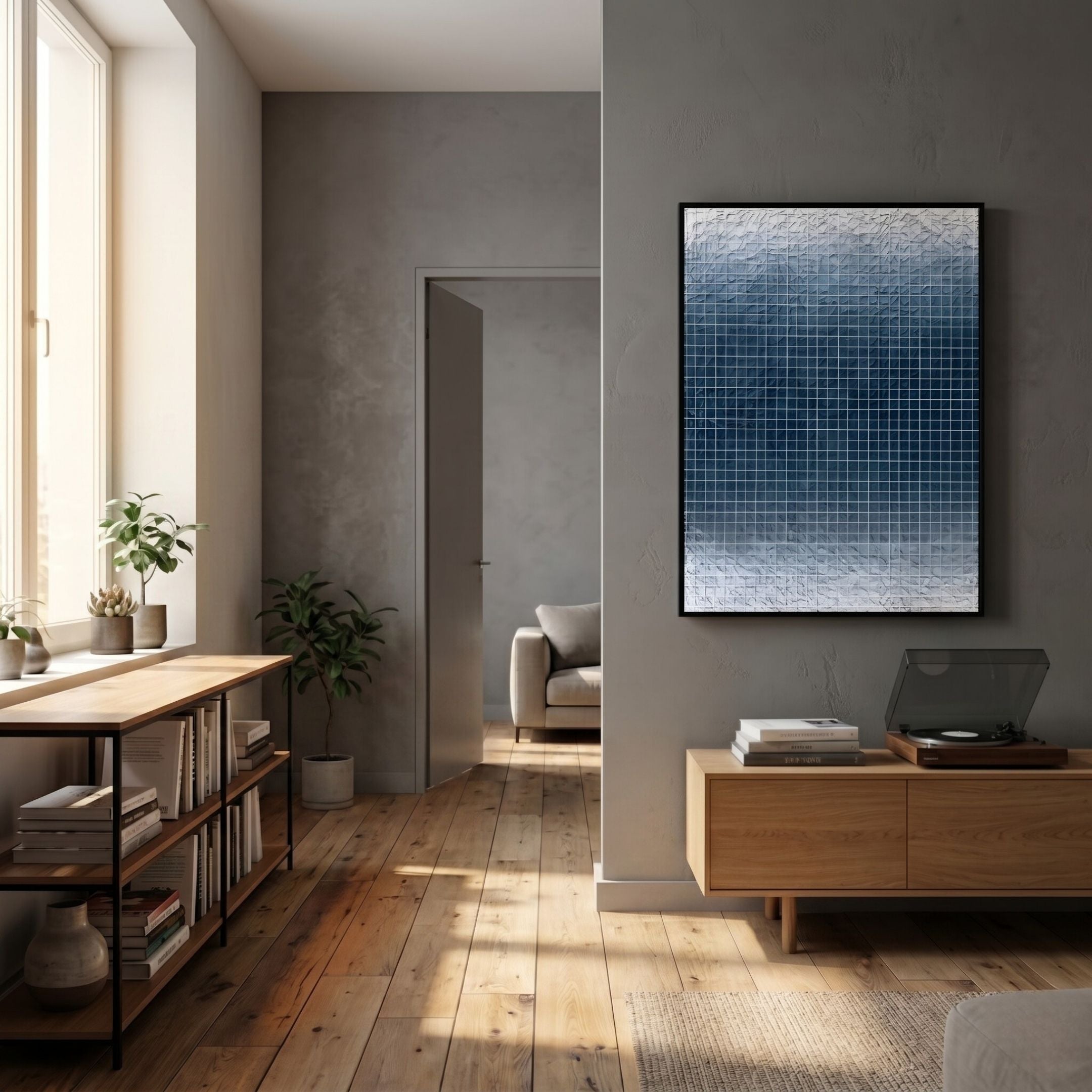 A modern living room with wooden floors, neutral gray walls, a Giant Sculptures Gridelle Deep Blue Gradient Grid 3D Paper Wall Art, a sideboard with a record player, shelves of plants and books by a sunlit window.