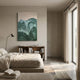 A modern minimal bedroom with neutral tones, beige bedding, a black floor lamp, wooden bookshelf, sunlight through sheer curtains, and Giant Sculptures' Terralune Green Layered Ridge 3D Wall Art as abstract decor on the wall.
