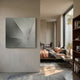 A modern bedroom showcases the Veylora Mist Silver Folded Texture Fabric 3D Wall Art by Giant Sculptures on a beige wall, with a brown-bedded bed, desk and chair, large sunlit windows, and a wooden bookshelf with assorted items.