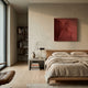 Minimalist bedroom featuring a wooden bed, beige bedding, side table with books and lamp, Veylora Terra Folded Texture Fabric 3D Wall Art by Giant Sculptures above the bed, built-in shelves, large window, and neutral decor.