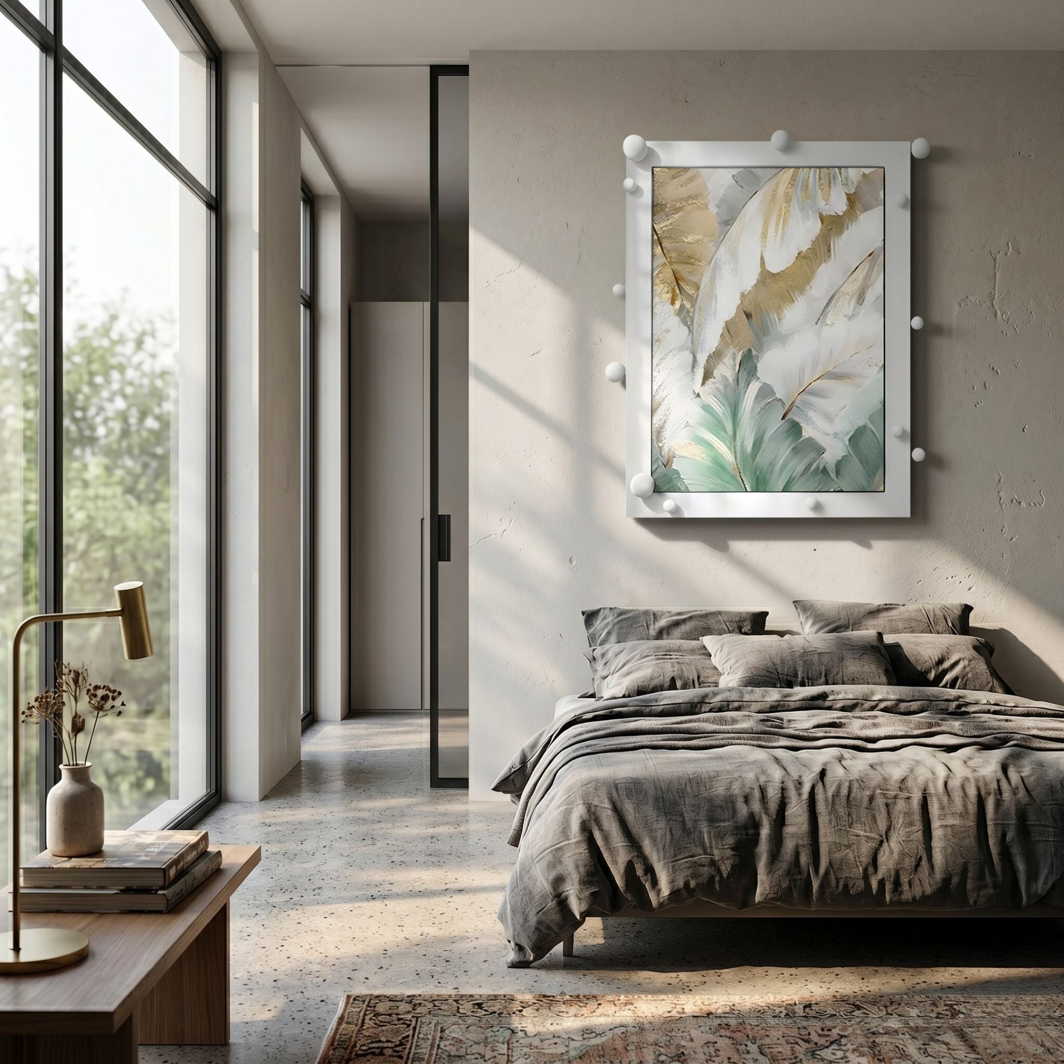 A modern bedroom with large windows, gray bedding, a small nightstand and lamp, sunlight streaming in through glass doors, and the Verdantia II Green & Gold Leaf Textured 3D Wall Art by Giant Sculptures displayed on the wall.