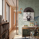 A cozy kids’ study area with a desk, chair, bookshelves, and the Cuddiloft Cream Bunny Plush Display 3D Wall Art by Giant Sculptures. The wall features constellation drawings and animal illustrations like a fox and whale—perfect nursery decor.