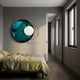 Aurelios Emerald Crystal Porcelain & Gold Orbit 3D Wall Art by Giant Sculptures mounted above a bed with olive linens in a grey-walled bedroom.