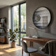Lunastria Silver Disc & Vertical Crystal Beads Round 3D Wall Art by Giant Sculptures mounted above a walnut desk in a modern home office with a rubber plant.
