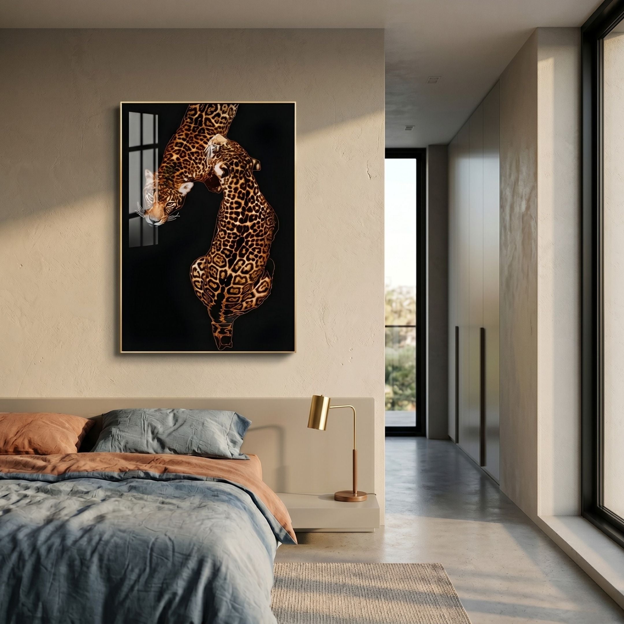 Auravalor Twin Leopards Crystal Porcelain Vertical 3D Wall Art in a thin gold frame, displayed above a bed with blue and terracotta linens in a modern bedroom.