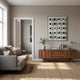 Orbivelle Emerald Patch Sphere & White Panel 3D Wall Art by Giant Sculptures displayed above a walnut sideboard in a Nordic living room with grey sofa.