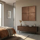 Terracrecta Cocoa Brown Painted Textured Square 3D Wall Art by Giant Sculptures mounted above a dark wood sideboard in a sunlit modern bedroom.