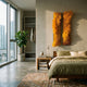 Bristella Sunburst Gold Textured 2-Panel 3D Wall Art mounted above a wood bed with olive linen in a modern bedroom with city-view window and fiddle leaf fig.