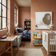 Blossomkin Lion 3D Floral Wall Art by Giant Sculptures in a gold frame above a white crib in a kids' room with terracotta walls, desk, and toddler bed.